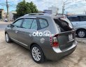 Kia Carens MT 2011 - Bán Kia Carens MT sản xuất 2011, màu xám xe gia đình