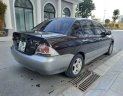 Mitsubishi Lancer 1.6 2003 - Cần bán Mitsubishi Lancer 1.6 sản xuất năm 2003, màu nâu giá cạnh tranh