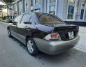 Mitsubishi Lancer 1.6 2003 - Cần bán Mitsubishi Lancer 1.6 sản xuất năm 2003, màu nâu giá cạnh tranh