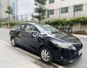 Toyota Vios E 2015 - Bán Toyota Vios E năm sản xuất 2015, màu đen số sàn, giá chỉ 295 triệu