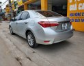 Toyota Corolla 2015 - Bán Toyota Corolla Altis 1.8G năm sản xuất 2015, màu bạc, thủ tục nhanh gọn giao xe ngay, giá cạnh tranh