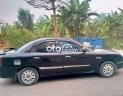 Daewoo Nubira  MT 2003 - Cần bán lại xe Daewoo Nubira MT năm sản xuất 2003, màu đen chính chủ