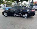 Toyota Camry LE 2.4 2010 - Bán Toyota Camry LE 2.4 năm 2010, màu đen xe gia đình