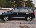 Kia Carens   2.0 AT 2009 - Cần bán gấp Kia Carens 2.0 AT năm sản xuất 2009, màu đen