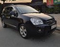 Kia Carens   2.0 AT 2009 - Cần bán gấp Kia Carens 2.0 AT năm sản xuất 2009, màu đen