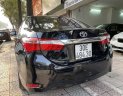 Toyota Corolla altis 2017 - Bán gấp Toyota Corolla Altis 1.8G AT năm 2017, màu đen, còn nguyên dàn lốp, xe rất mới, giá tốt