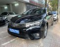 Toyota Corolla altis 2017 - Bán gấp Toyota Corolla Altis 1.8G AT năm 2017, màu đen, còn nguyên dàn lốp, xe rất mới, giá tốt