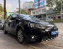 Toyota Corolla altis 2017 - Bán gấp Toyota Corolla Altis 1.8G AT năm 2017, màu đen, còn nguyên dàn lốp, xe rất mới, giá tốt