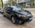 Toyota Corolla altis 2017 - Bán gấp Toyota Corolla Altis 1.8G AT năm 2017, màu đen, còn nguyên dàn lốp, xe rất mới, giá tốt