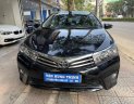 Toyota Corolla altis 2017 - Bán gấp Toyota Corolla Altis 1.8G AT năm 2017, màu đen, còn nguyên dàn lốp, xe rất mới, giá tốt