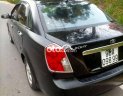 Daewoo Lacetti SE 2009 - Cần bán xe Daewoo Lacetti SE sản xuất năm 2009, màu đen giá cạnh tranh