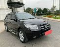 Hyundai Santa Fe MLX  2009 - Bán xe Hyundai Santa Fe MLX năm sản xuất 2009, màu đen 