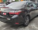 Toyota Corolla 1.8G AT  2019 - Cần bán xe Toyota Corolla Altis 1.8G AT sản xuất 2019, màu nâu chính chủ