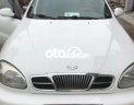 Daewoo Lanos 2002 - Cần bán gấp Daewoo Lanos sản xuất năm 2002, màu trắng, xe nhập