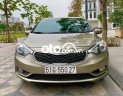 Kia K3  2.0AT 2015 - Bán Kia K3 2.0AT năm sản xuất 2015, màu vàng cát, giá bán 445 triệu