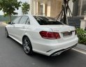 Mercedes-Benz E250  AMG  2015 - Bán Mercedes E250 AMG năm sản xuất 2015, màu trắng, xe nhập ít sử dụng