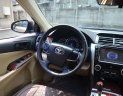 Toyota Camry 2014 - Cần bán gấp Toyota Camry 2.0E AT màu vàng đồng, năm sản xuất 2014, nguồn gốc rõ ràng, giấy tờ đầy đủ