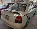 Daewoo Nubira 2.0 2002 - Cần bán lại xe Daewoo Nubira 2.0 sản xuất 2002, màu trắng