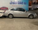 Chevrolet Lacetti   1.6MT 2011 - Cần bán gấp Chevrolet Lacetti 1.6MT sản xuất năm 2011, màu bạc 