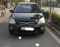 Kia Carens 2.0 2009 - Bán ô tô Kia Carens 2.0 năm 2009, màu đen còn mới, giá 245tr