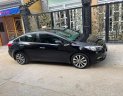 Kia K3 2.0 2015 - Bán xe Kia K3 2.0 sản xuất năm 2015, màu đen, giá 465tr