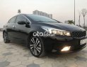 Kia Cerato   AT 2018 - Cần bán gấp Kia Cerato AT năm 2018, màu đen