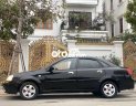Daewoo Lacetti  EX 2005 - Cần bán lại xe Daewoo Lacetti EX năm 2005, màu đen, giá 115tr