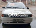 Mazda 323 1996 - Cần bán lại xe Mazda 323 2.0MT sản xuất 1996, màu trắng, xe nhập