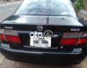 Mazda 626  MT 2000 - Cần bán xe Mazda 626 MT năm sản xuất 2000, màu đen, nhập khẩu nguyên chiếc 