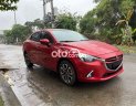 Mazda 2 2016 - Bán xe Mazda 2 1.5AT sản xuất năm 2016, màu đỏ 