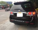 Toyota Fortuner   4X4AT 2012 - Bán Toyota Fortuner 4X4AT năm sản xuất 2012, màu đen xe gia đình