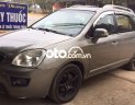 Kia Carens    2.0MT 2011 - Cần bán gấp Kia Carens 2.0MT sản xuất năm 2011, màu xám còn mới