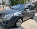 Kia Carens   2.0AT 2012 - Bán ô tô Kia Carens 2.0AT sản xuất năm 2012, màu xám số tự động