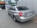 Chevrolet Lacetti  EX 1.6MT 2009 - Bán lại xe Chevrolet Lacetti EX 1.6MT sản xuất 2009, màu bạc xe gia đình