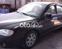 Kia Spectra 2005 - Bán xe Kia Spectra sản xuất 2005, màu đen, nhập khẩu nguyên chiếc