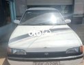Mazda 323 1995 - Bán ô tô Mazda 323 sản xuất 1995, màu trắng, nhập khẩu