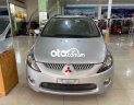 Mitsubishi Grandis 2.4 Mivec 2005 - Bán ô tô Mitsubishi Grandis 2.4 Mivec sản xuất 2005, màu bạc số tự động, giá chỉ 262 triệu