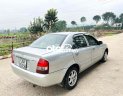 Mazda 323 2004 - Cần bán gấp Mazda 323 năm sản xuất 2004, màu bạc, xe nhập giá cạnh tranh