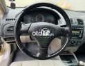 Mazda 323 2004 - Cần bán gấp Mazda 323 năm sản xuất 2004, màu bạc, xe nhập giá cạnh tranh