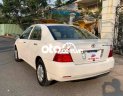 Toyota Corolla 2004 - Cần bán Toyota Corolla sản xuất năm 2004, màu trắng, nhập khẩu nguyên chiếc