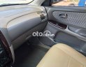 Mazda 626 2003 - Cần bán lại xe Mazda 626 sản xuất năm 2003, màu đen, 159tr