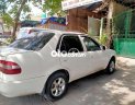 Toyota Corolla 1998 - Bán Toyota Corolla MT sản xuất năm 1998, màu kem (be), giá tốt