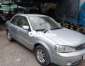 Ford Laser 2004 - Bán ô tô Ford Laser LXI năm 2004, màu bạc số sàn