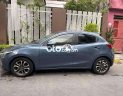 Mazda 2 2016 - Bán xe Mazda 2 1.5AT sản xuất năm 2016, màu xanh lam mới chạy 45.000 km