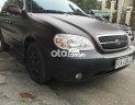 Kia Carnival 2009 - Xe Kia Carnival năm sản xuất 2009, màu nâu, nhập khẩu 