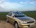 Ford Laser 2000 - Bán Ford Laser sản xuất năm 2000, màu vàng