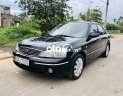 Ford Laser 2004 - Bán ô tô Ford Laser sản xuất 2004, màu đen, 157 triệu