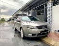 Kia Forte 2011 - Cần bán Kia Forte 1.6AT sản xuất 2011, màu xám xe gia đình