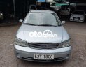 Ford Laser 2004 - Bán ô tô Ford Laser LXI năm 2004, màu bạc số sàn