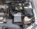 Ford Laser 2004 - Bán ô tô Ford Laser LXI năm 2004, màu bạc số sàn